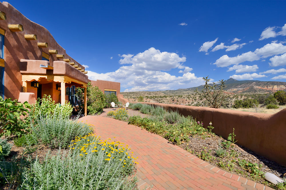Courtyard entry for straw bale home in Abiquiu, NM 